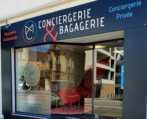 Enseigne MC votre bagagerie et conciergerie